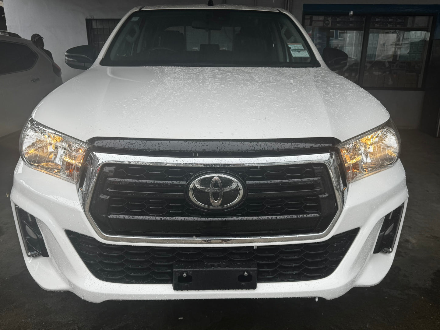 Toyota Hilux 4x4 White with back soft cover